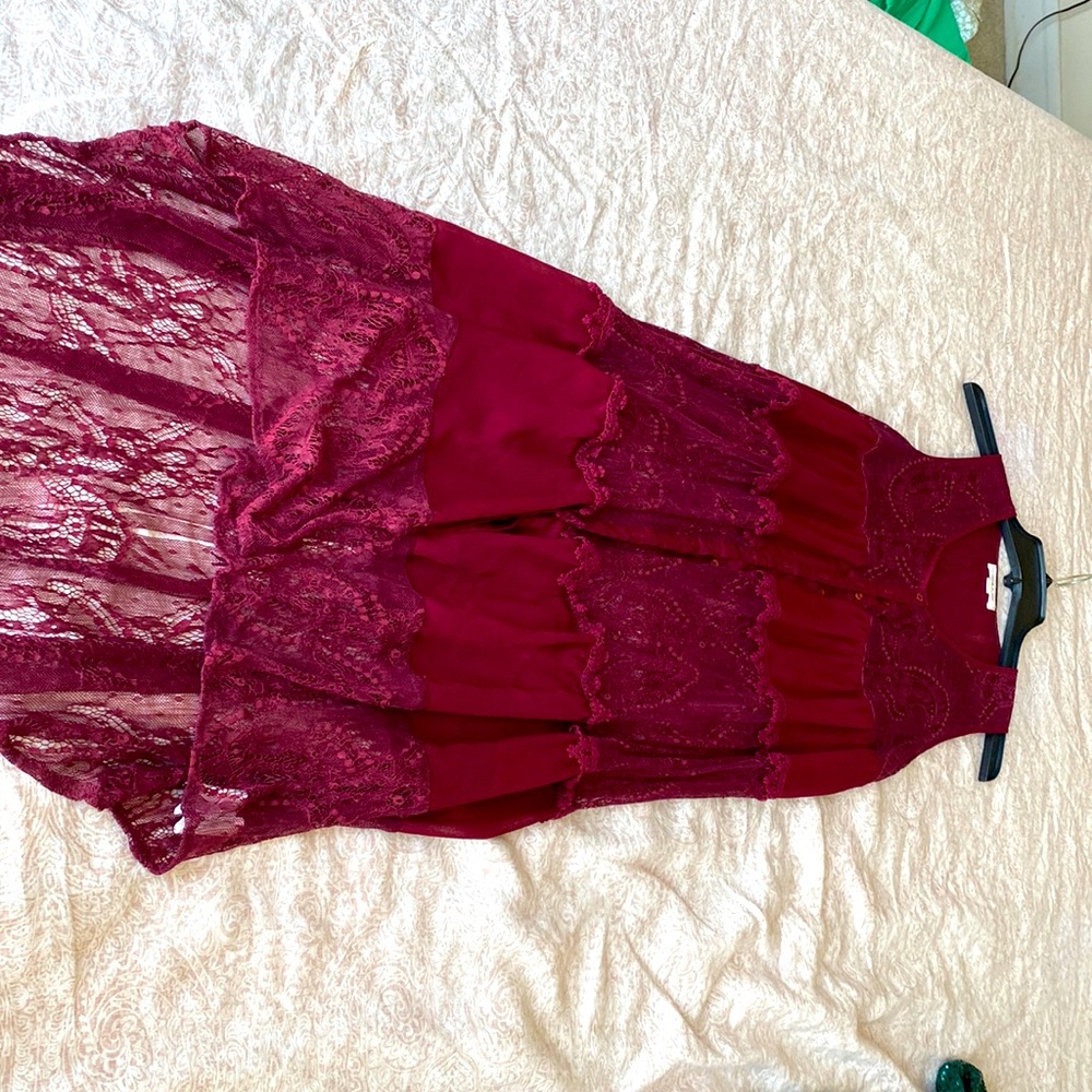 Light weight, high-low cover up. Perfect for the pool, or a basic black dress.